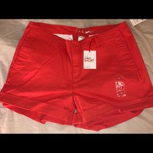 E.L.L.E. Everyday, coral shorts.